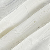 Noémie white cutout pleated mini dress
