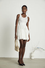Noémie white cutout pleated mini dress
