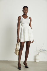 Noémie white cutout pleated mini dress