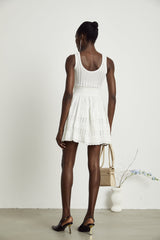 Noémie white cutout pleated mini dress