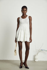 Noémie white cutout pleated mini dress