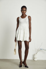 Noémie white cutout pleated mini dress