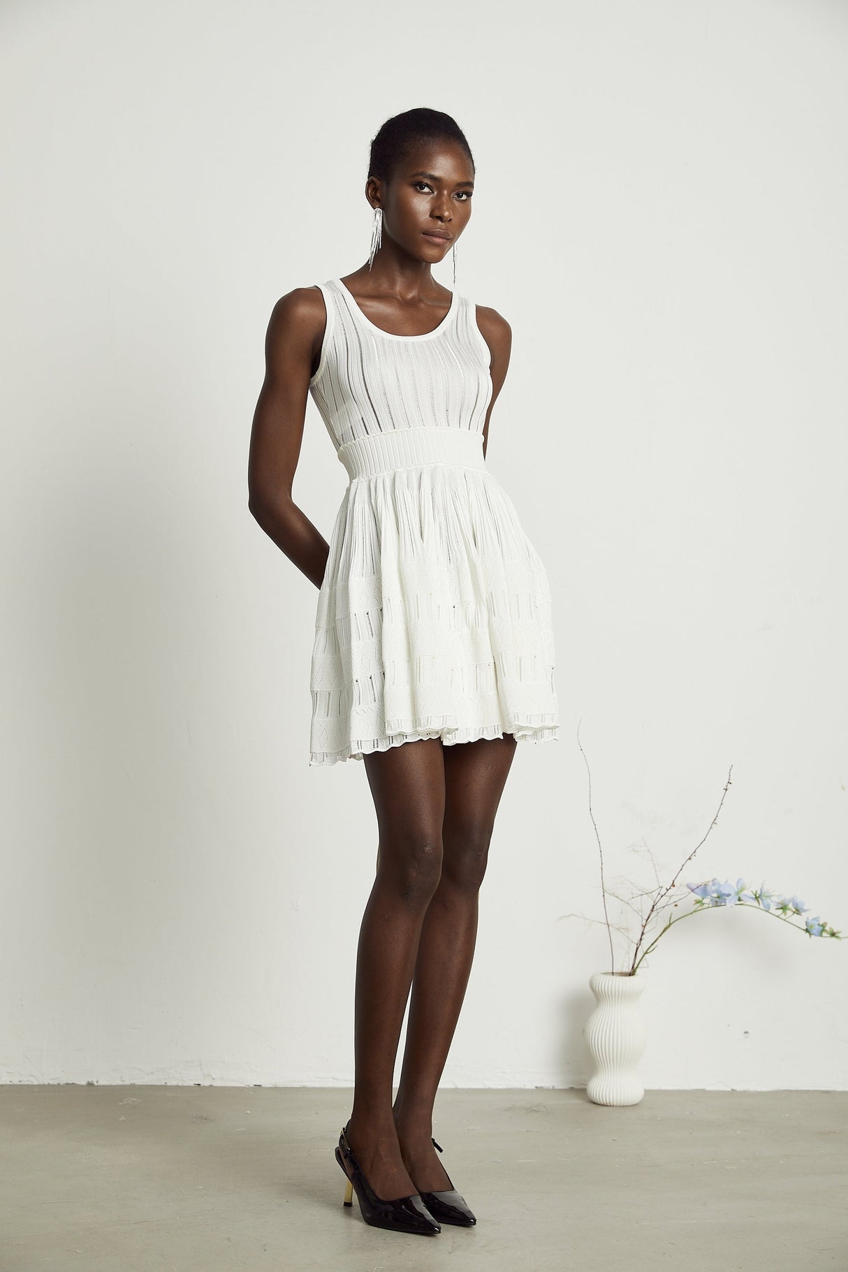 Noémie white cutout pleated mini dress