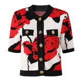 Paola Top – Short Sleeve Boxy Fit – Floral Pattern – Gold Button Detail – Decorative Pockets – Textured Knit Fabric – Casual Style