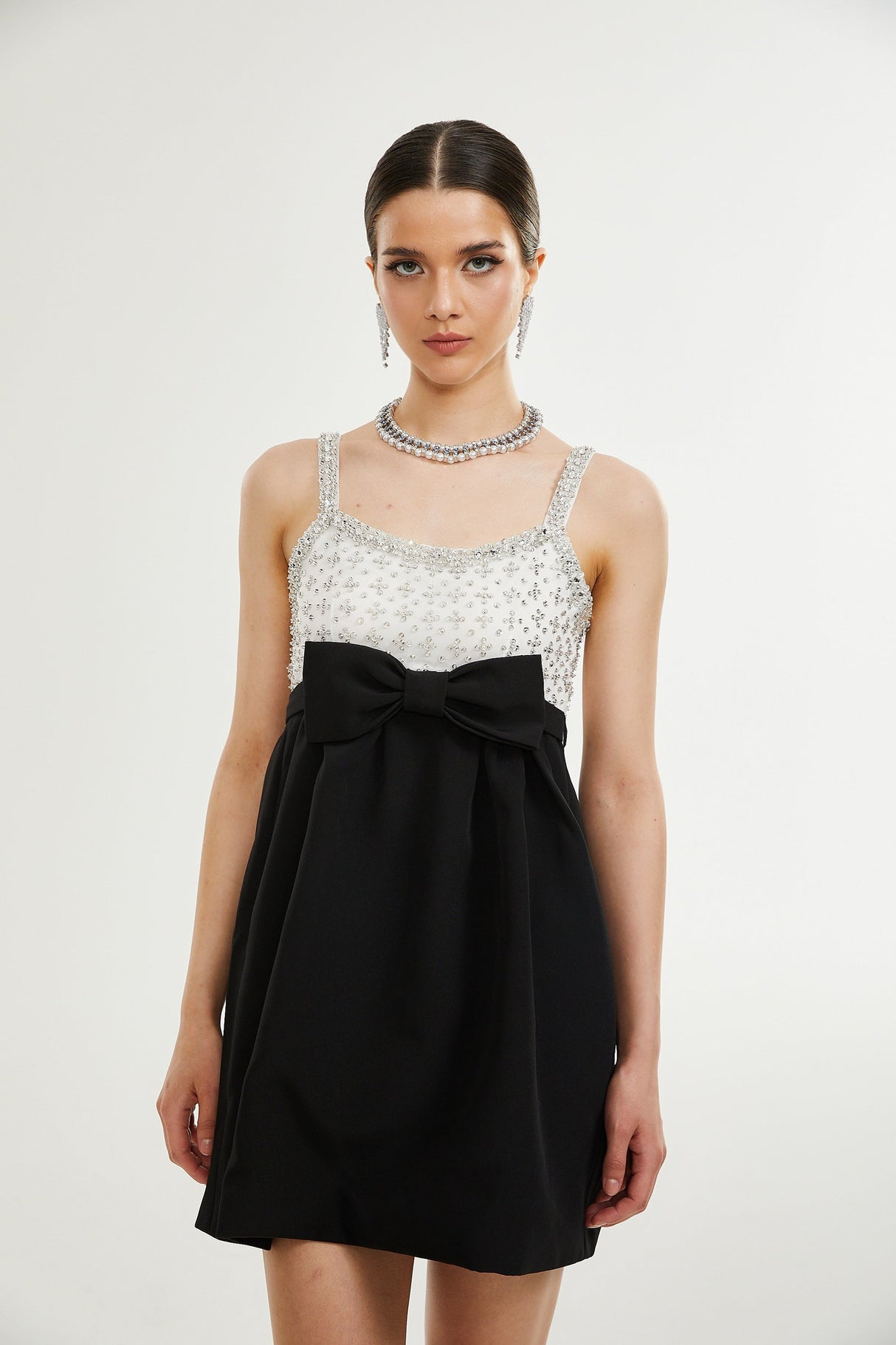 Parisa crystalembellished bowknot mini dress