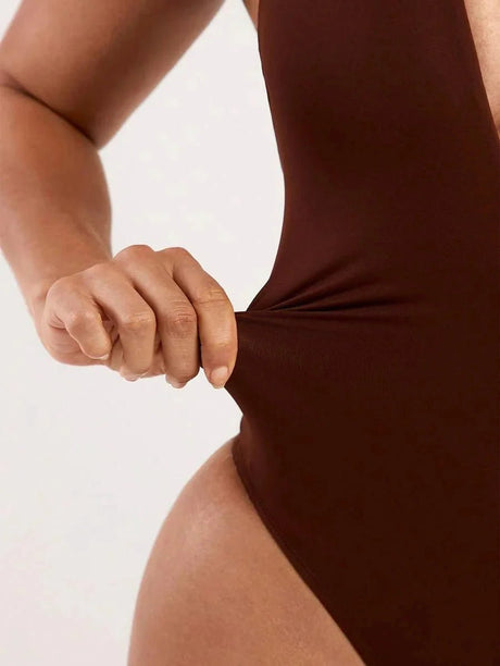 Penelope Bodysuit - High Stretch Knitted Fabric - Slim Fit - Neckline Halter - Sleeveless - Waist Line Natural (mid Waist) - Backless, Knot