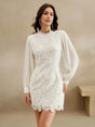This elegant white dress features intricate lace detailing with a flattering fitted silhouette, accentuated by voluminous.