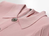 Pink A-line silhouette with flared skirt and decorative buttons knit dress
