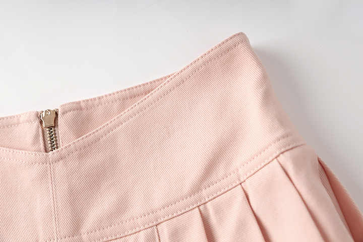 Pink high-waisted A-line skirt with double-breasted button detailing