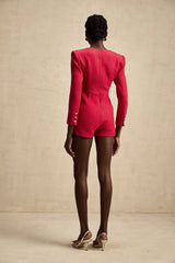 Pink long sleeved bodysuit with cut out details named Celestine