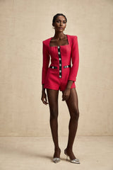 Pink long sleeved bodysuit with cut out details named Celestine