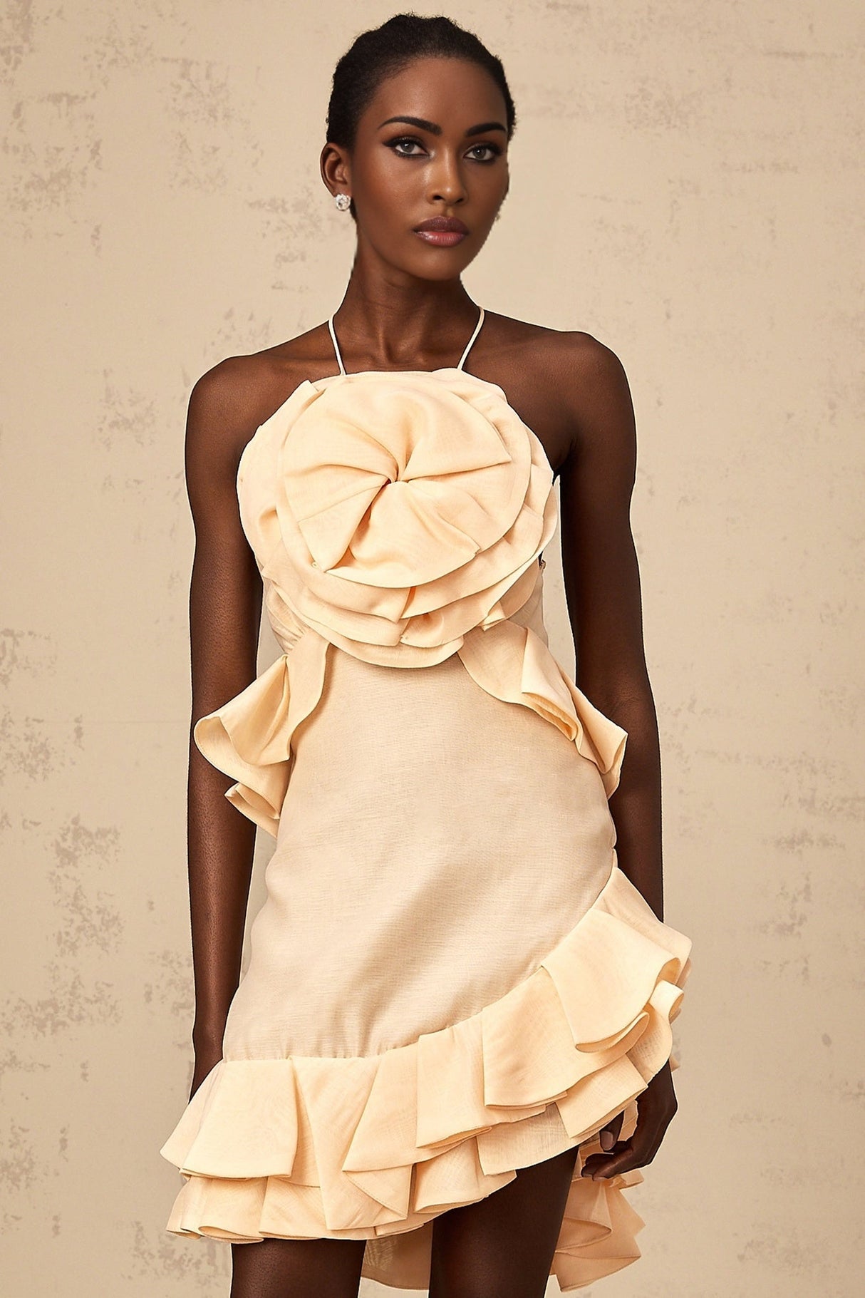 Pink mini dress with 3d petal ruffles featuring a short length and textured floral design