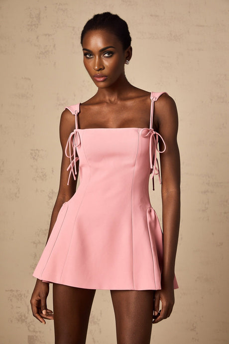 Pink mini dress with puff sleeves and detachable strap by Donatienne