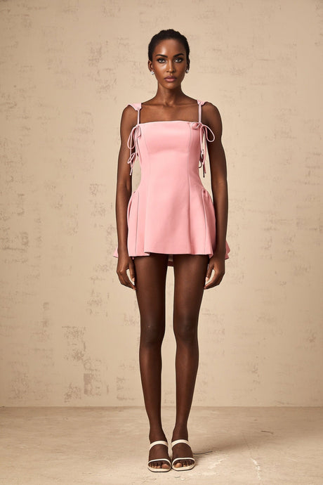 Pink mini dress with puff sleeves and detachable strap by Donatienne