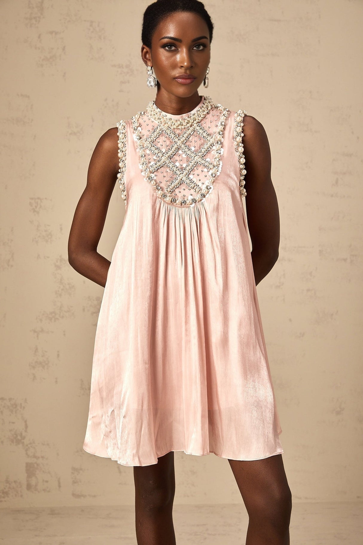 Pink pleated mini dress with embellishments named Helena