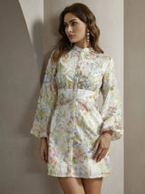 This charming floral dress features a soft, pastel color palette with shades of pink, yellow, and green, perfect for a.