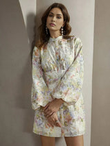 This enchanting floral dress features a delicate pastel palette with shades of purple, pink, and green, perfect for.