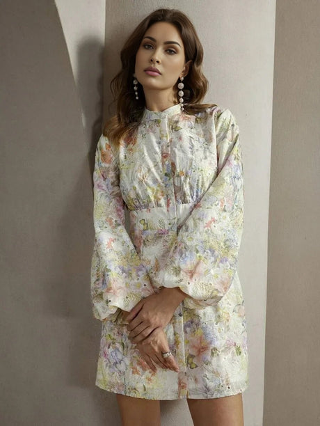 This enchanting floral dress features a delicate pastel palette with shades of purple, pink, and green, perfect for.