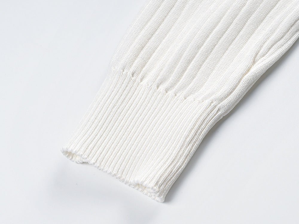 Raven Top – Fitted Ribbed Knit – Collared Design – Gold Button Accents – Decorative Pockets – Tailored Silhouette – Stretch Fabric