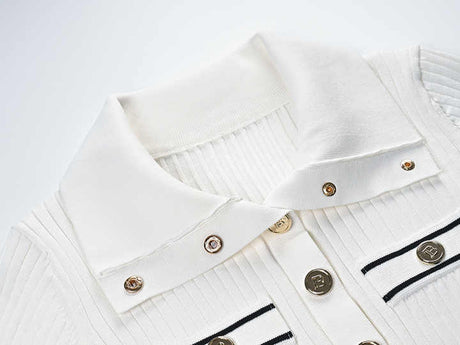 Raven Top – Fitted Ribbed Knit – Collared Design – Gold Button Accents – Decorative Pockets – Tailored Silhouette – Stretch Fabric