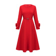 Red long sleeve dress with floral embellishments from Aurelia brand