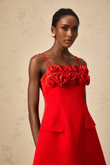 Red mini dress with flared skirt and rose applique details