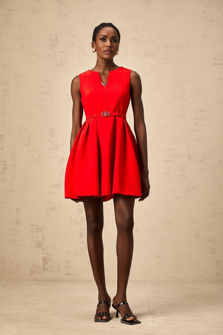 Red mini dress with split neckline and cinched waist
