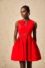 Red mini dress with split neckline and cinched waist