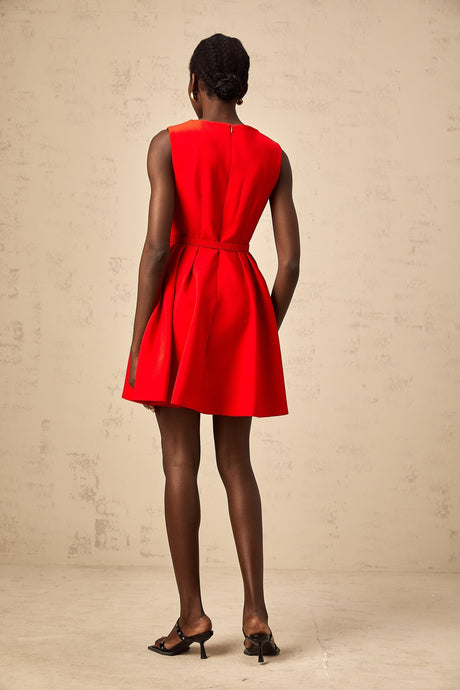 Red mini dress with split neckline and cinched waist
