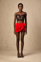 Red mini skirt with floral applique details and boned structure named Anne