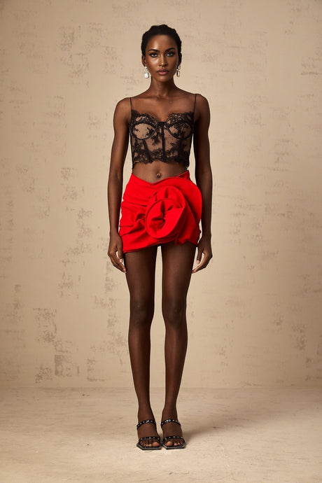 Red mini skirt with floral applique details and boned structure named Anne