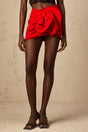 Red mini skirt with floral applique details and boned structure