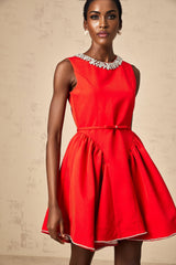 Red pleated mini dress with embellishments named Leonie