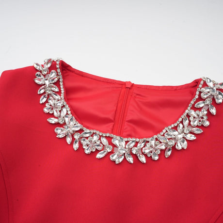 Red pleated mini dress with embellishments named Leonie