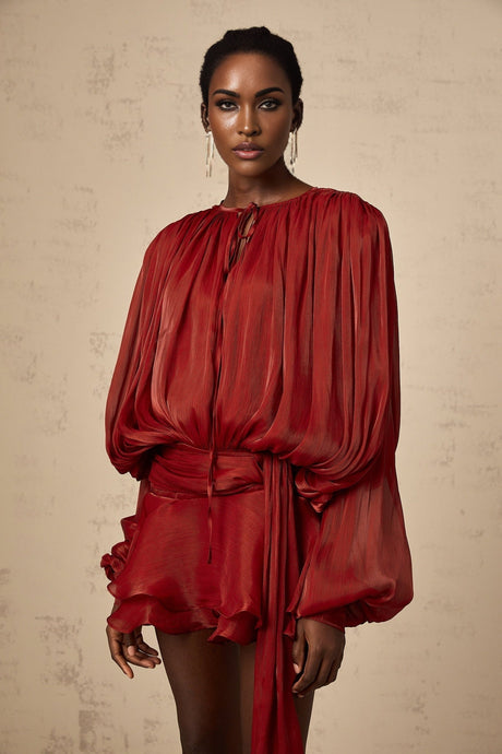 Red pleated mini dress with ruffles and full skirt named Eugenie