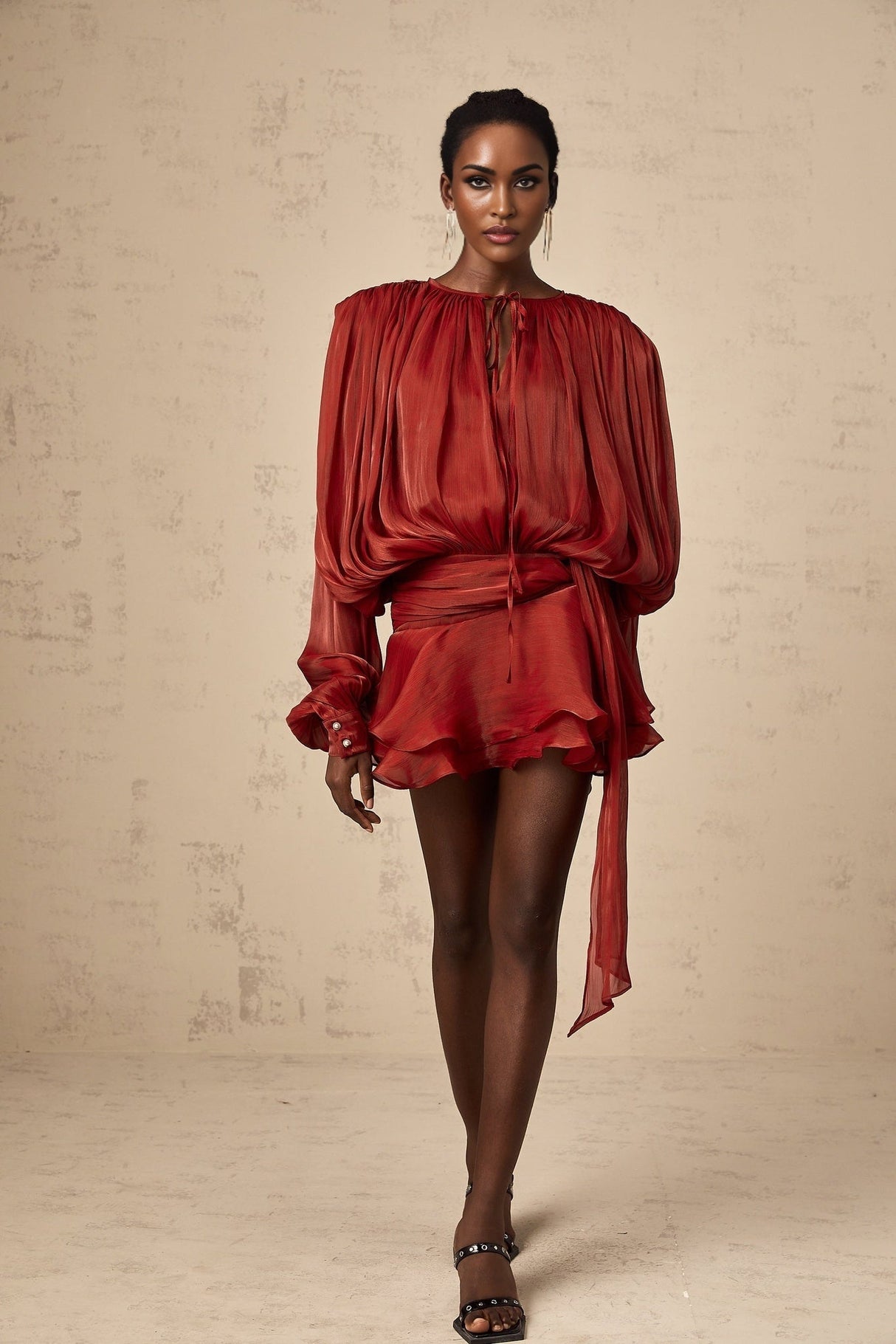 Red pleated mini dress with ruffles and full skirt named Eugenie