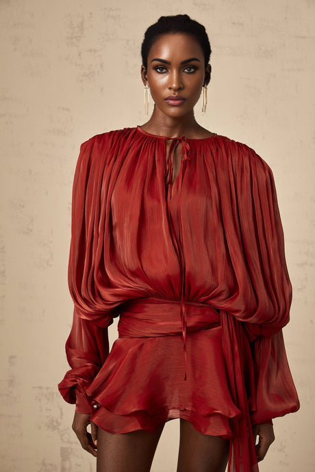 Red pleated mini dress with ruffles and full skirt named Eugenie