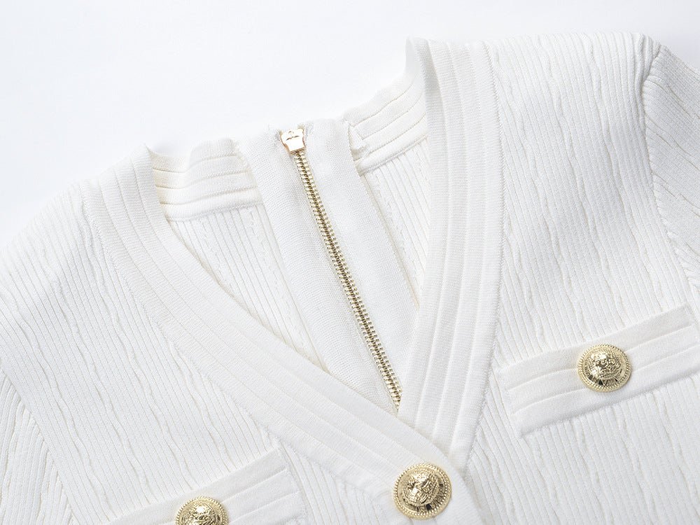 Roselia Top – Fitted Ribbed Knit – Short Sleeves – Gold Button Detail – Front Pockets – Tailored Silhouette – Textured Fabric