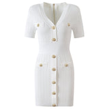 Roselia Top – Fitted Ribbed Knit – Short Sleeves – Gold Button Detail – Front Pockets – Tailored Silhouette – Textured Fabric