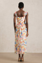 Ruby Beige Floral Maxi Dress Halter Neckline Lightweight Fabric Vibrant Prints B-Folds Casual Formal Brunch Gathering Chic Comfortable Fit Versatile Quality Craftsmanship Unforgettable Memories