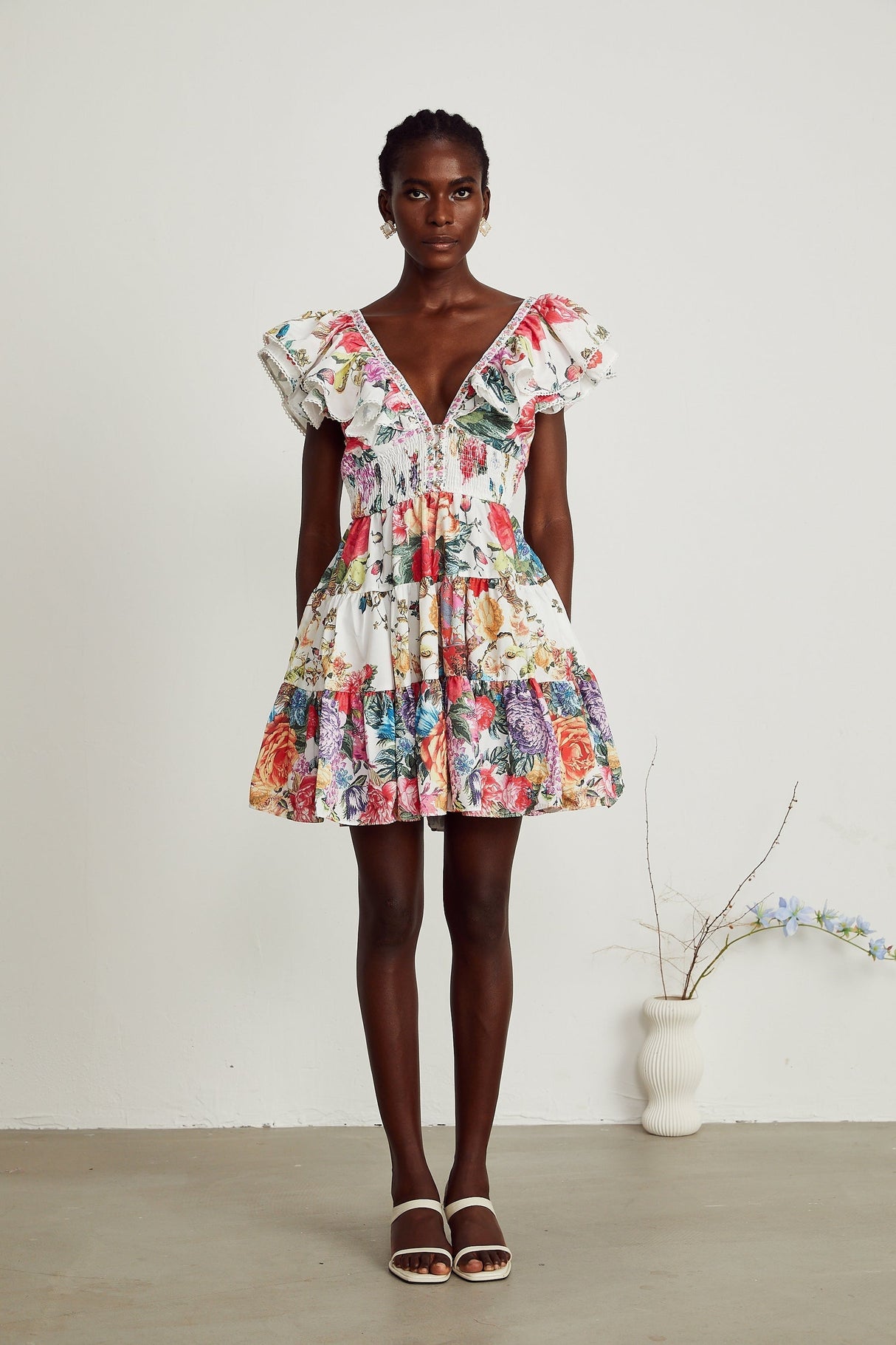 Saige ruffled floralprint mini dress in White