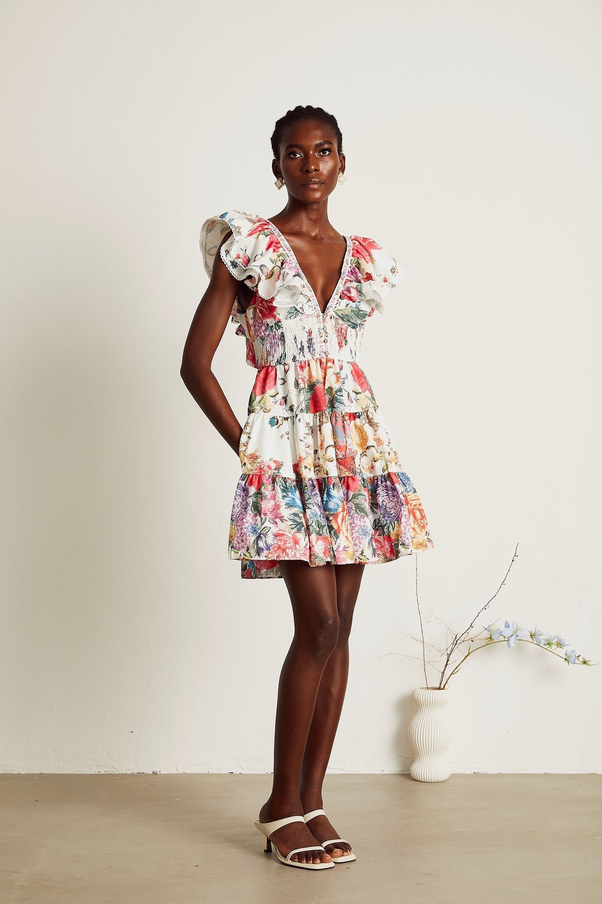 Saige ruffled floralprint mini dress in White