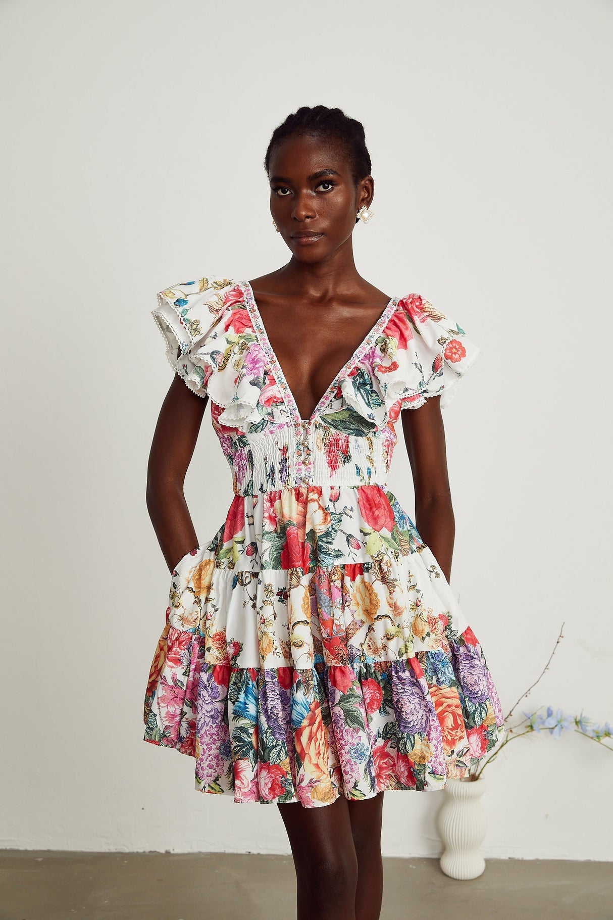 Saige ruffled floralprint mini dress in White
