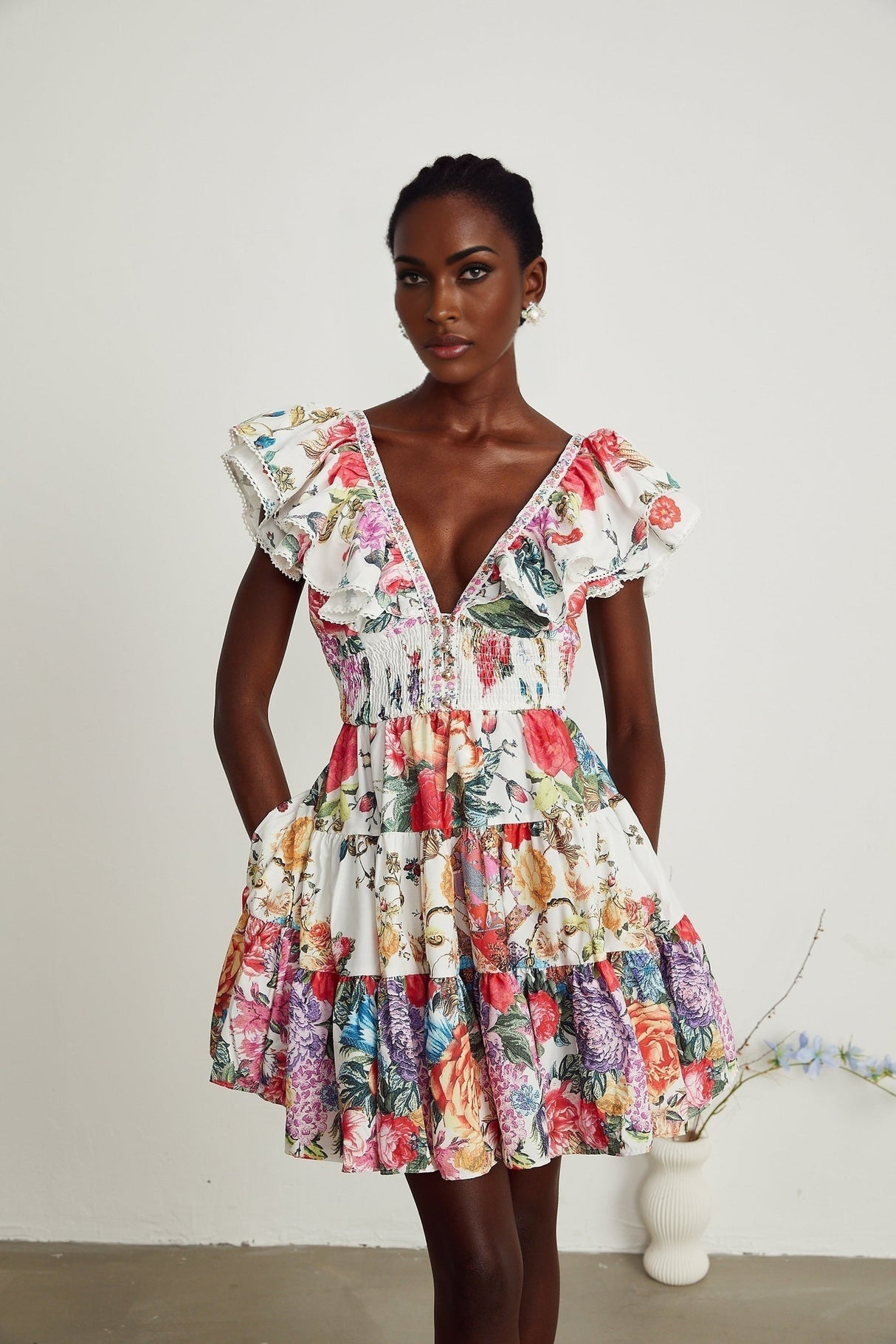 Saige ruffled floralprint mini dress in White