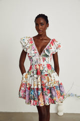 Saige ruffled floralprint mini dress in White