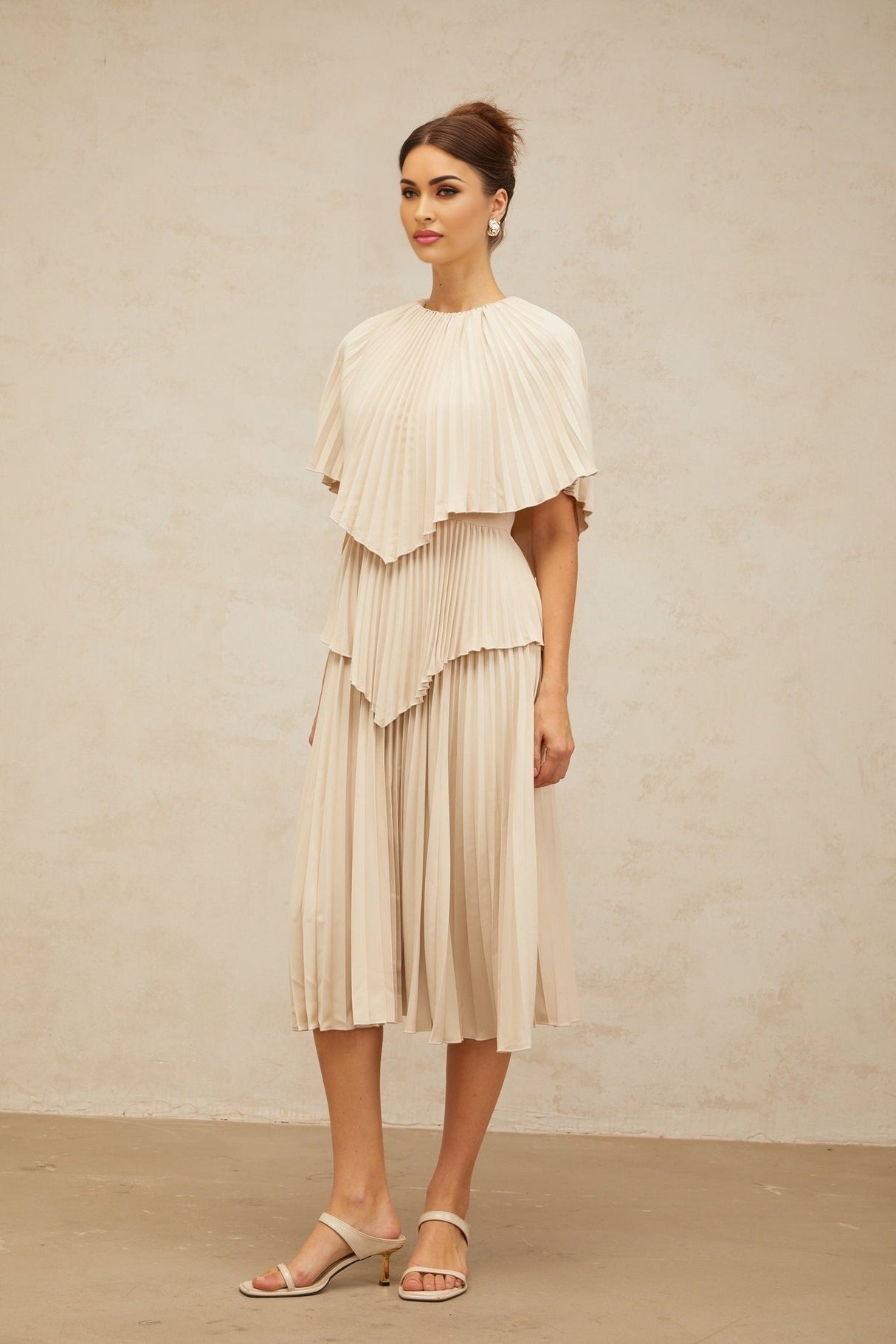Serafina Midi Dress in Neutrals Crew Neck Batwing Pleated Cape Zip Calf Length