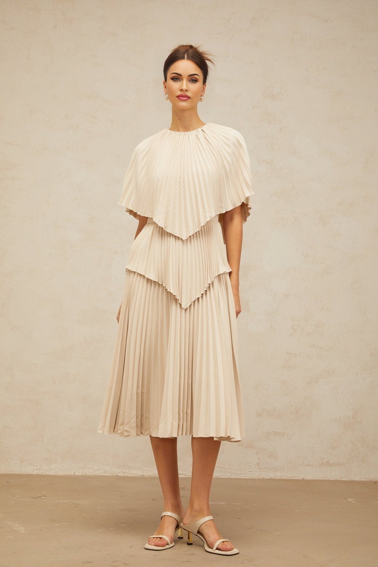 Serafina Midi Dress in Neutrals Crew Neck Batwing Pleated Cape Zip Calf Length