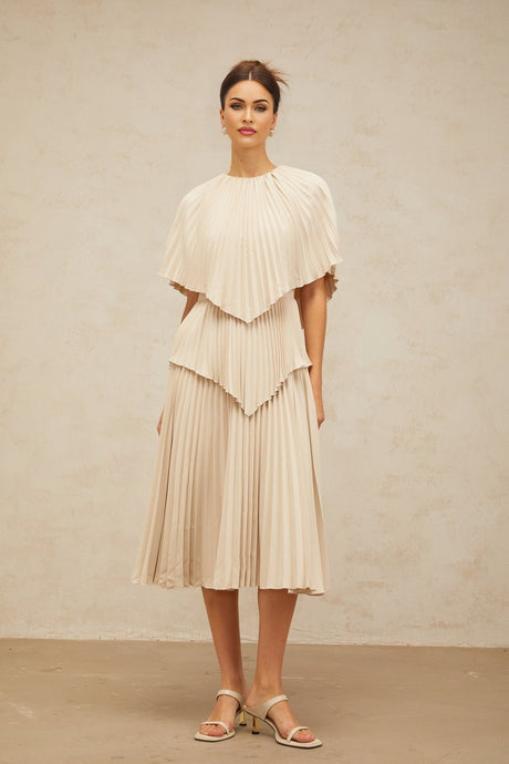 Serafina Midi Dress in Neutrals Crew Neck Batwing Pleated Cape Zip Calf Length
