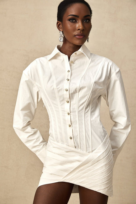 Simple white pleated mini shirt dress with fitted waist by Orlane