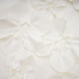 Sleeveless white maxi dress with bow and artificial flower decoration named Magali